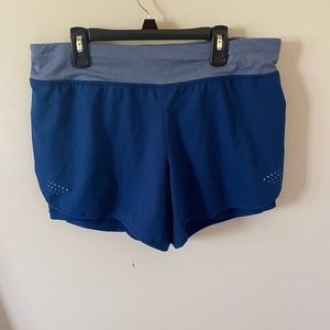 Navy blue athletic shorts. Size medium (8-10)